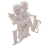 Cherubs Pair Holding LOVE Letters